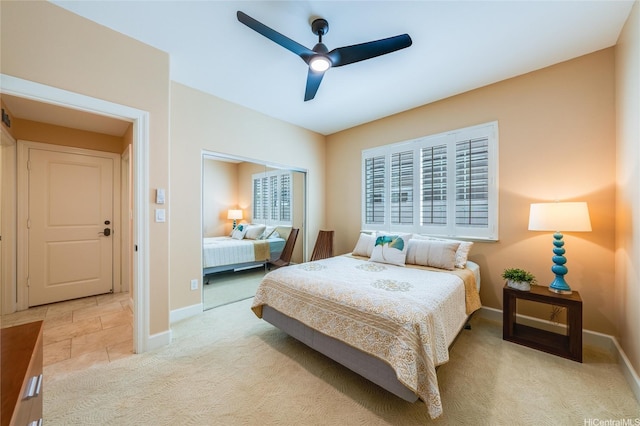 91-1099 Waikai St, Ewa Beach, HI 96706 - bedroom featuring light colored carpet, baseboards, and ceiling fan