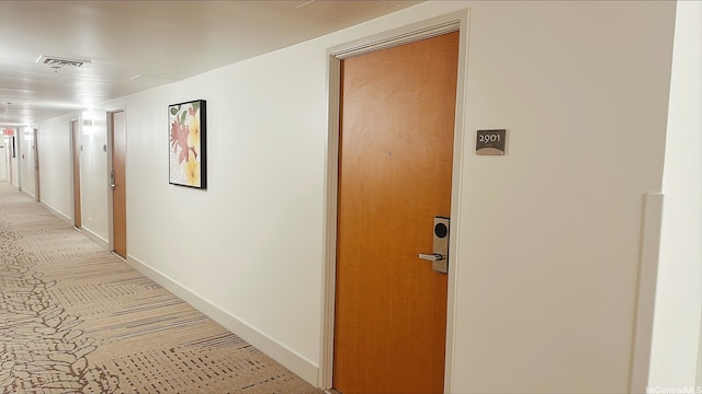 410 Atkinson Dr Unit 2901, Honolulu, HI 96814 - corridor with light carpet and baseboards