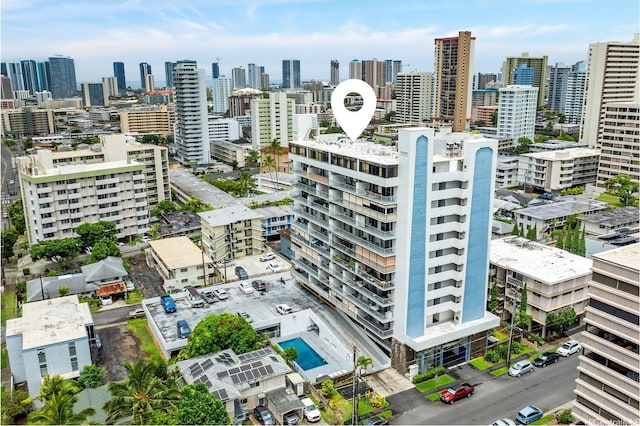 1333 Heulu St Unit 808, Honolulu, HI 96822 - aerial view of city skyline and a pool