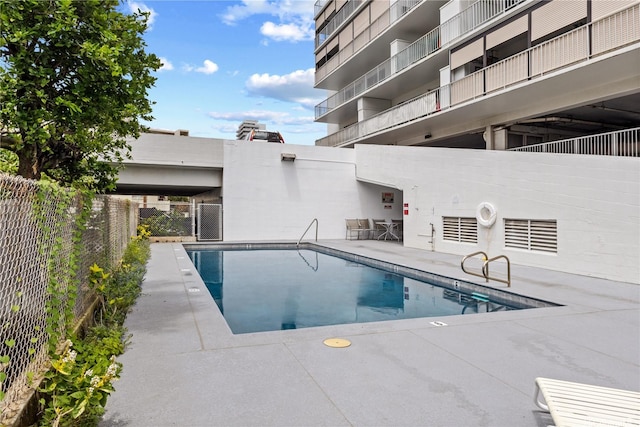 1333 Heulu St Unit 808, Honolulu, HI 96822 - community pool featuring a patio