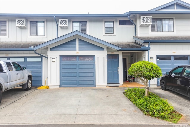 95-955 Ukuwai St Unit 1703, Mililani, HI 96789 - view of property with board and batten siding and roof with shingles