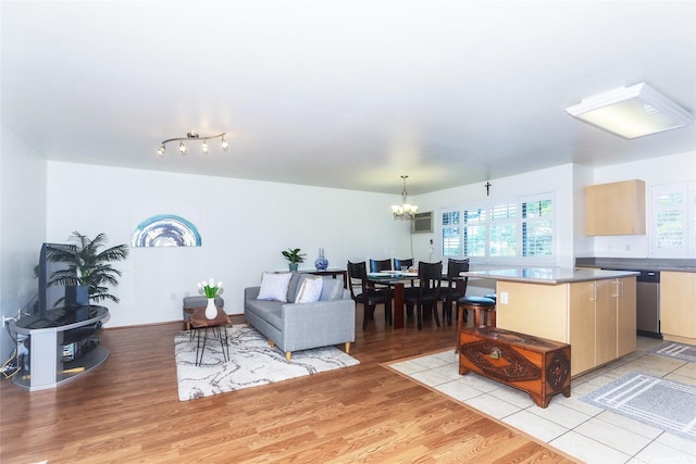 95-955 Ukuwai St Unit 1703, Mililani, HI 96789 - living room with a chandelier and light wood finished floors