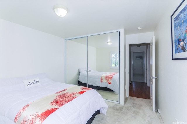 95-955 Ukuwai St Unit 1703, Mililani, HI 96789 - bedroom featuring light colored carpet and a closet