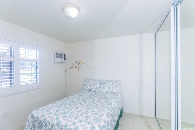 95-955 Ukuwai St Unit 1703, Mililani, HI 96789 - bedroom featuring a wall unit AC and carpet