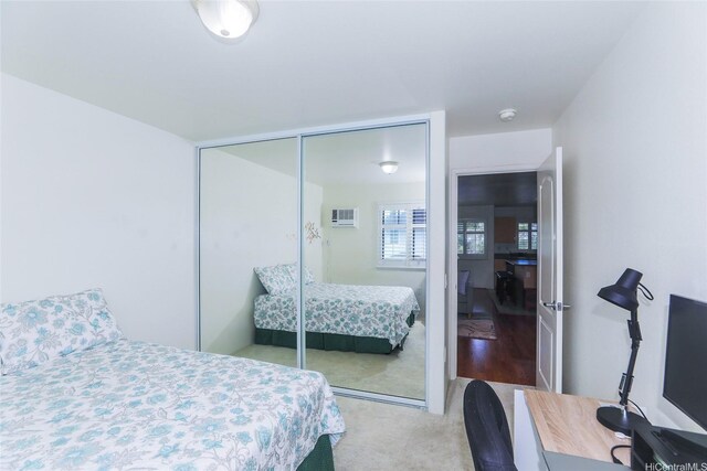 95-955 Ukuwai St Unit 1703, Mililani, HI 96789 - carpeted bedroom with a closet and a wall mounted AC