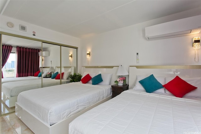 1777 Ala Moana Blvd Unit 937, Honolulu, HI 96815 - bedroom featuring a wall mounted air conditioner and a closet