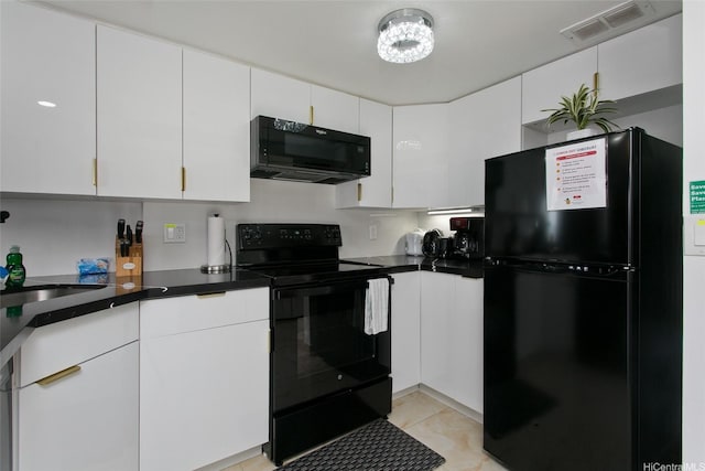 1777 Ala Moana Blvd Unit 937, Honolulu, HI 96815 - kitchen with black appliances, white cabinets, dark countertops, and a sink