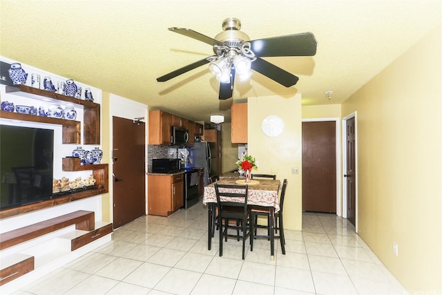 1260 Richard Ln Unit B601, Honolulu, HI 96819 - dining room featuring a ceiling fan and light tile patterned floors