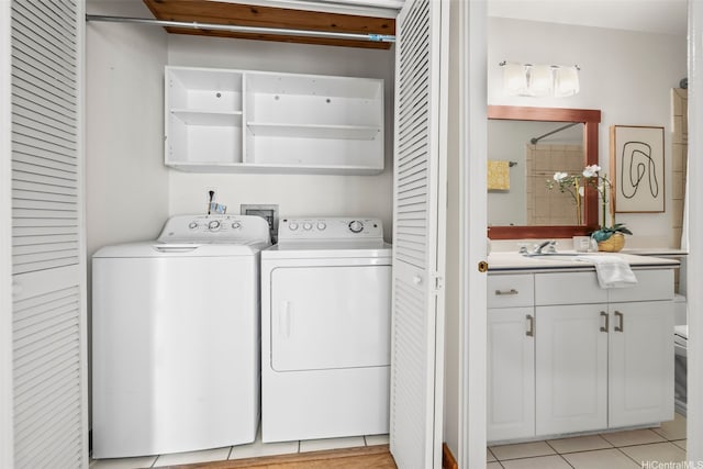 44-140-5MUIPL Mui Pl Unit 2705, Kaneohe, HI 96744 - laundry area with washing machine and dryer and light tile patterned floors