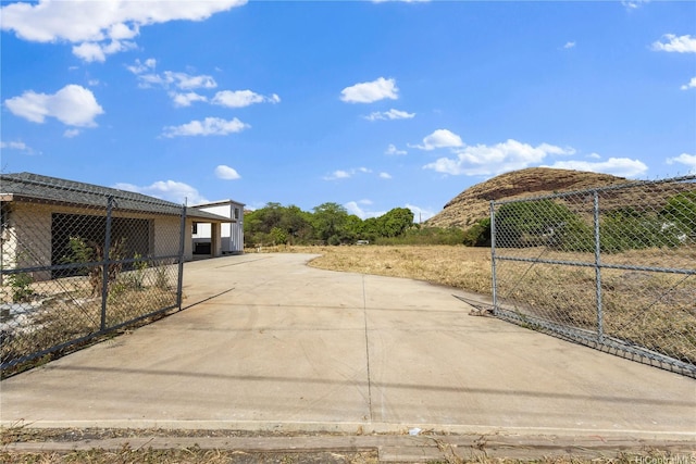 86-524 Halona Rd Unit A, Waianae, HI 96792 - view of yard with concrete driveway and a carport