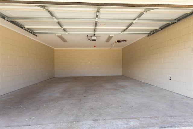 86-524 Halona Rd Unit A, Waianae, HI 96792 - garage featuring a garage door opener and concrete block wall