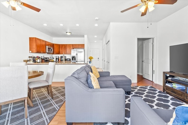 87-176 Maipalaoa Rd Unit J24, Waianae, HI 96792 - living area featuring a ceiling fan, light wood-style flooring, and recessed lighting