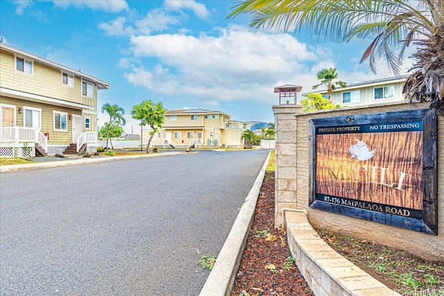 87-176 Maipalaoa Rd Unit J24, Waianae, HI 96792 - view of asphalt road featuring a residential view and curbs