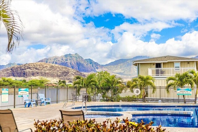 87-176 Maipalaoa Rd Unit J24, Waianae, HI 96792 - community pool with a mountain view and a community hot tub