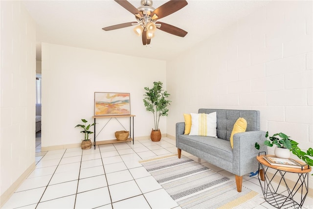 1519 Kaumualii St Unit 316, Honolulu, HI 96817 - sitting room with a ceiling fan, light tile patterned flooring, and baseboards