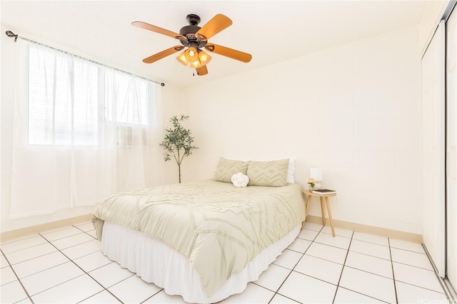 1519 Kaumualii St Unit 316, Honolulu, HI 96817 - bedroom featuring light tile patterned floors and a ceiling fan