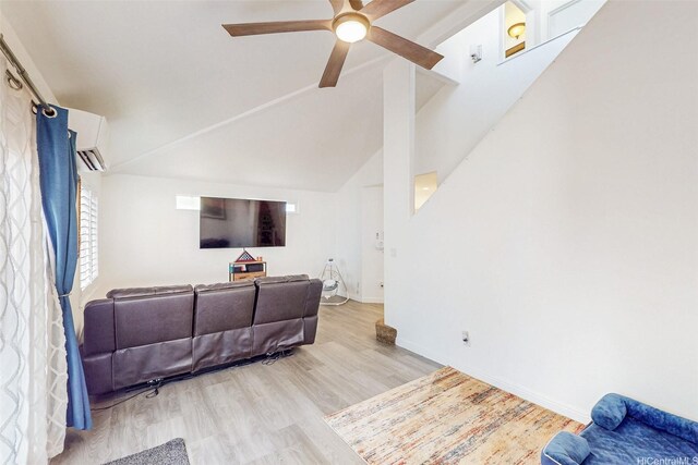 91-215 Keonekapu Pl, Ewa Beach, HI 96706 - living room featuring ceiling fan, wood finished floors, vaulted ceiling, a wall mounted air conditioner, and baseboards