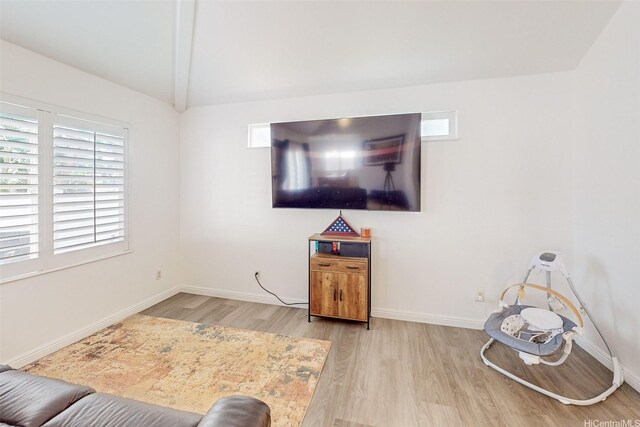 91-215 Keonekapu Pl, Ewa Beach, HI 96706 - living area featuring wood finished floors, healthy amount of natural light, and baseboards