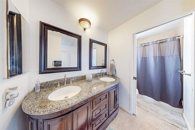 91-215 Keonekapu Pl, Ewa Beach, HI 96706 - bathroom featuring double vanity, tile patterned floors, toilet, a shower with curtain, and baseboards