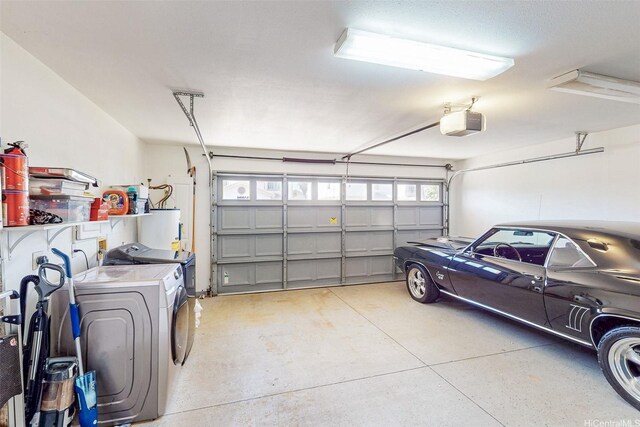 91-215 Keonekapu Pl, Ewa Beach, HI 96706 - garage featuring water heater, a garage door opener, and washing machine and clothes dryer