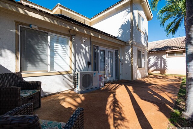 91-215 Keonekapu Pl, Ewa Beach, HI 96706 - view of patio / terrace with french doors and ac unit