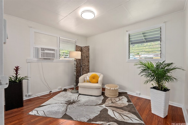 41-179 Nalu St, Waimanalo, HI 96795 - living area featuring wood finished floors, cooling unit, and baseboards
