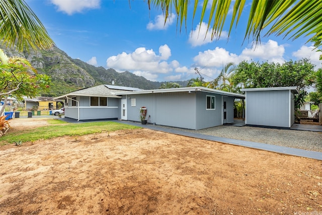 41-179 Nalu St, Waimanalo, HI 96795 - rear view of property with a mountain view and solar panels