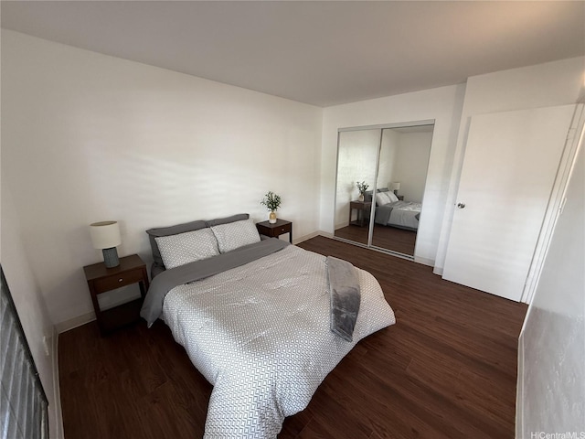 87-130 Helelua St Unit E102, Waianae, HI 96792 - bedroom featuring wood finished floors and a closet