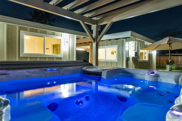 174 Hauoli St, Kailua, HI 96734 - pool at night featuring a hot tub