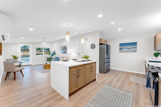 174 Hauoli St, Kailua, HI 96734 - kitchen with stainless steel fridge, black stove, light wood-style flooring, recessed lighting, and baseboards