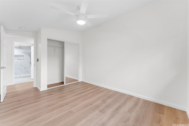 174 Hauoli St, Kailua, HI 96734 - unfurnished bedroom featuring a closet, light wood finished floors, and baseboards
