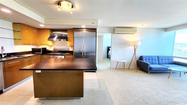 1200 Queen Emma St Unit 2804, Honolulu, HI 96813 - kitchen with a sink, a wall unit AC, under cabinet range hood, dark countertops, and brown cabinetry