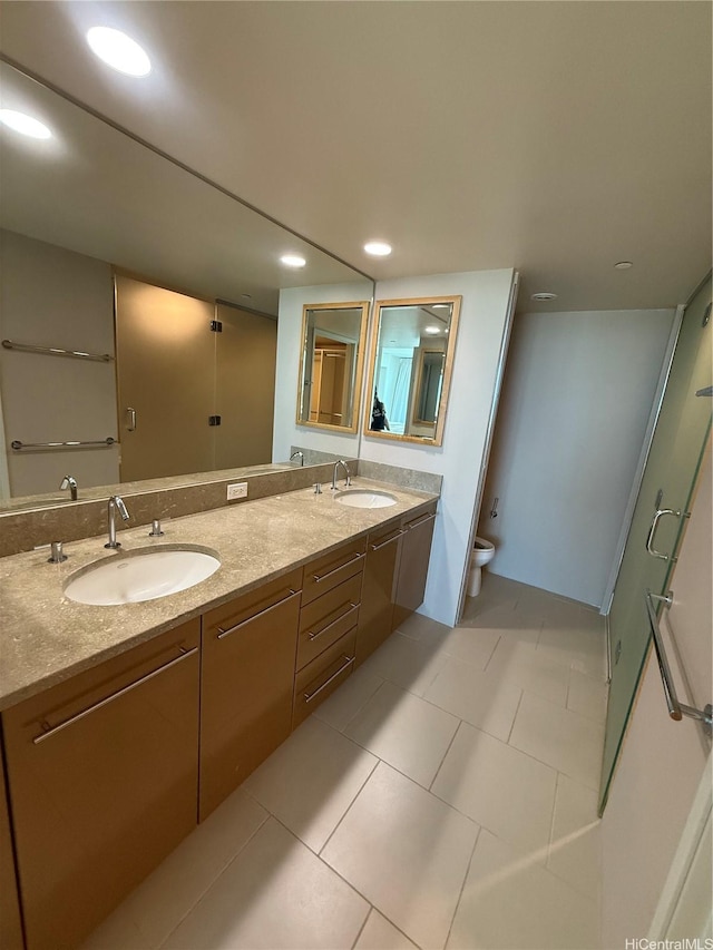 1200 Queen Emma St Unit 2804, Honolulu, HI 96813 - full bathroom featuring double vanity, toilet, recessed lighting, and tile patterned floors