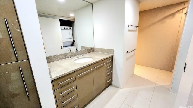1200 Queen Emma St Unit 2804, Honolulu, HI 96813 - bathroom featuring estacked washer and dryer, vanity, tile patterned floors, and recessed lighting
