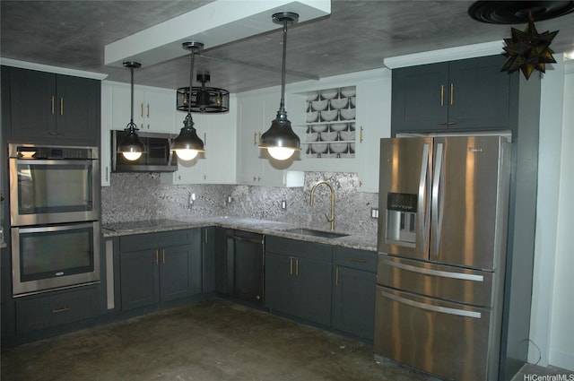 60 N Beretania St Unit 909, Honolulu, HI 96817 - kitchen with appliances with stainless steel finishes, a sink, light stone countertops, backsplash, and concrete flooring