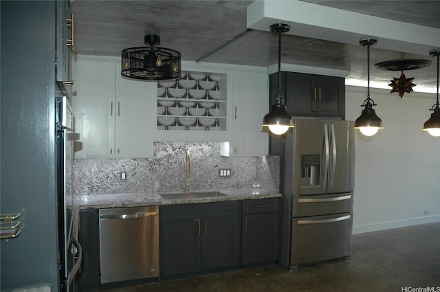 60 N Beretania St Unit 909, Honolulu, HI 96817 - kitchen with stainless steel appliances, a sink, light stone countertops, decorative backsplash, and finished concrete flooring