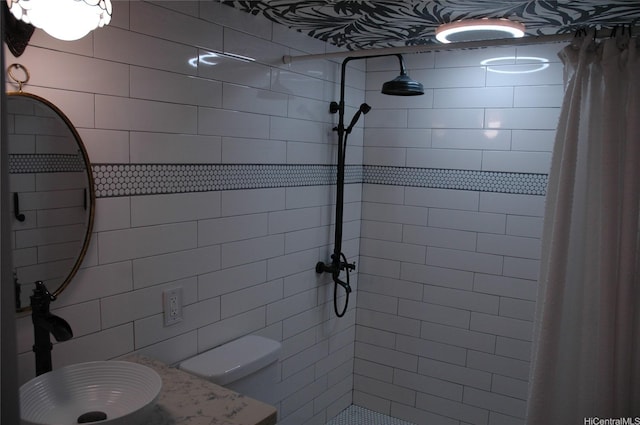 60 N Beretania St Unit 909, Honolulu, HI 96817 - full bathroom with tiled shower, a sink, and toilet