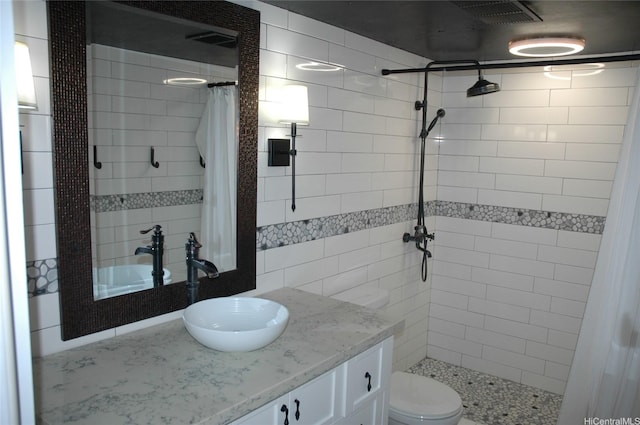 60 N Beretania St Unit 909, Honolulu, HI 96817 - full bath featuring a shower stall, vanity, and toilet
