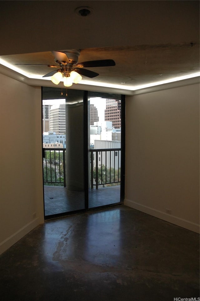 60 N Beretania St Unit 909, Honolulu, HI 96817 - unfurnished room with finished concrete flooring, baseboards, and a ceiling fan