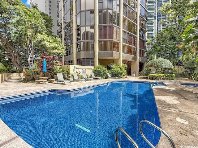 60 N Beretania St Unit 909, Honolulu, HI 96817 - community pool featuring a patio area