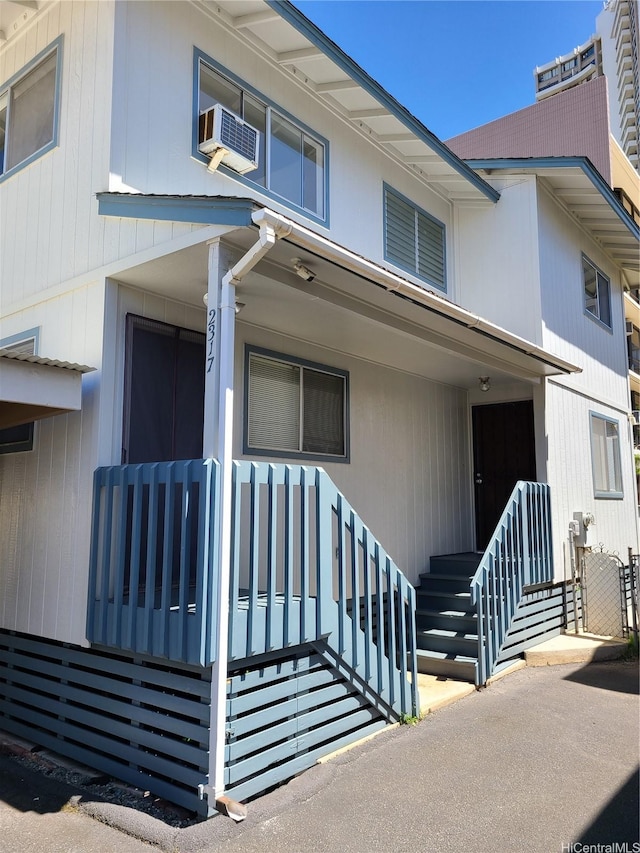 2317 Lime St Unit 2317, Honolulu, HI 96826 - view of front of property with a porch