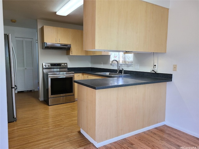 2317 Lime St Unit 2317, Honolulu, HI 96826 - kitchen featuring appliances with stainless steel finishes, light brown cabinets, a sink, under cabinet range hood, and a peninsula