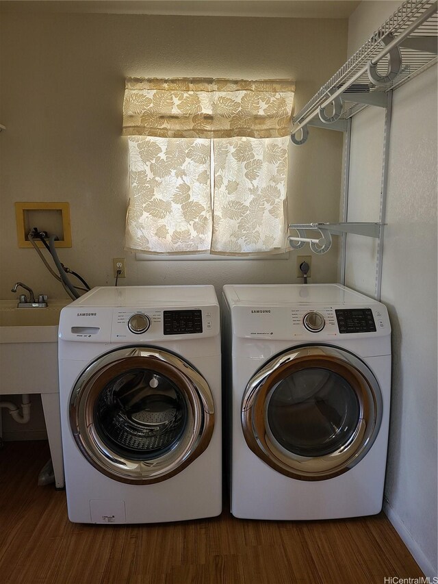 2317 Lime St Unit 2317, Honolulu, HI 96826 - laundry room featuring washer and dryer and wood finished floors