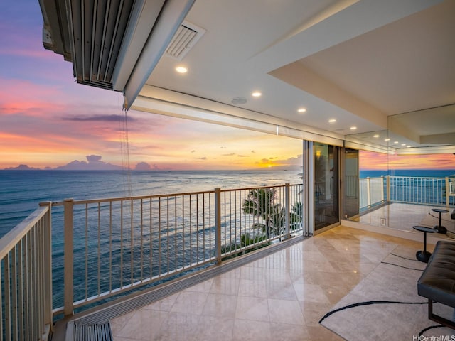 3015 Kalakaua Ave Unit 901, Honolulu, HI 96815 - balcony at dusk with a water view