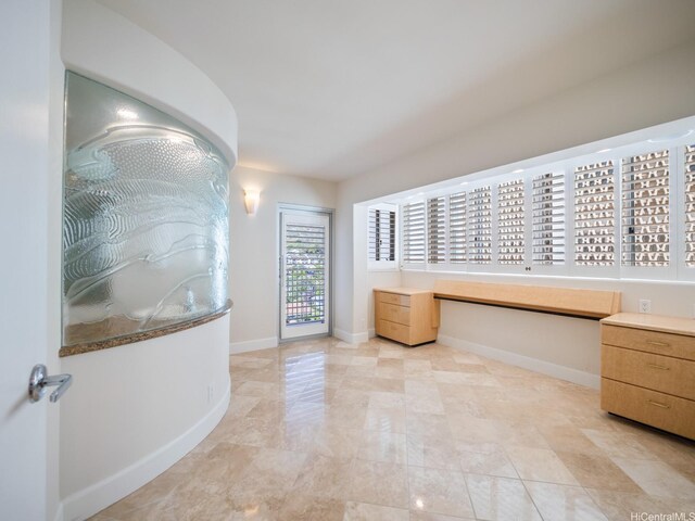 3015 Kalakaua Ave Unit 901, Honolulu, HI 96815 - interior space featuring built in desk and baseboards
