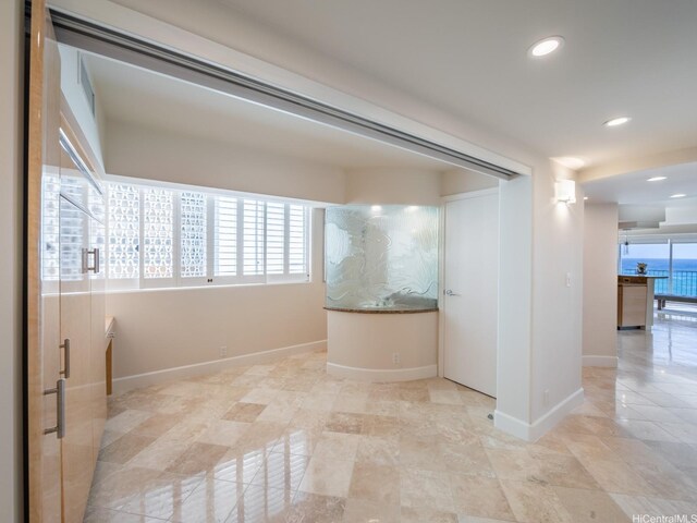 3015 Kalakaua Ave Unit 901, Honolulu, HI 96815 - bathroom featuring baseboards, healthy amount of natural light, recessed lighting, and a shower with shower door