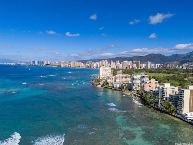 3015 Kalakaua Ave Unit 901, Honolulu, HI 96815 - water view with nearby urban area and a mountainous background