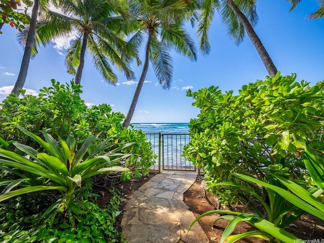 3015 Kalakaua Ave Unit 901, Honolulu, HI 96815 - view of patio / terrace featuring a water view and a gate