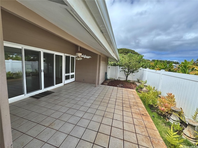225 Aikane St, Kailua, HI 96734 - fenced backyard featuring a patio area and a ceiling fan