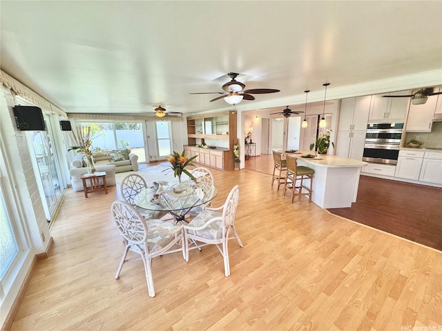 225 Aikane St, Kailua, HI 96734 - dining room with light wood-style floors and a ceiling fan